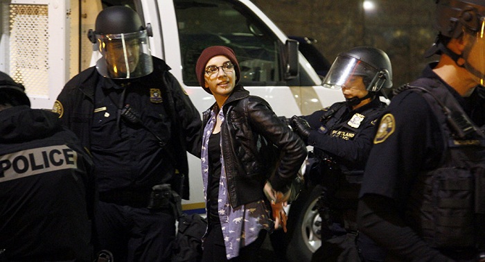 Oregon police say arrest at least 29 in anti-Trump riot